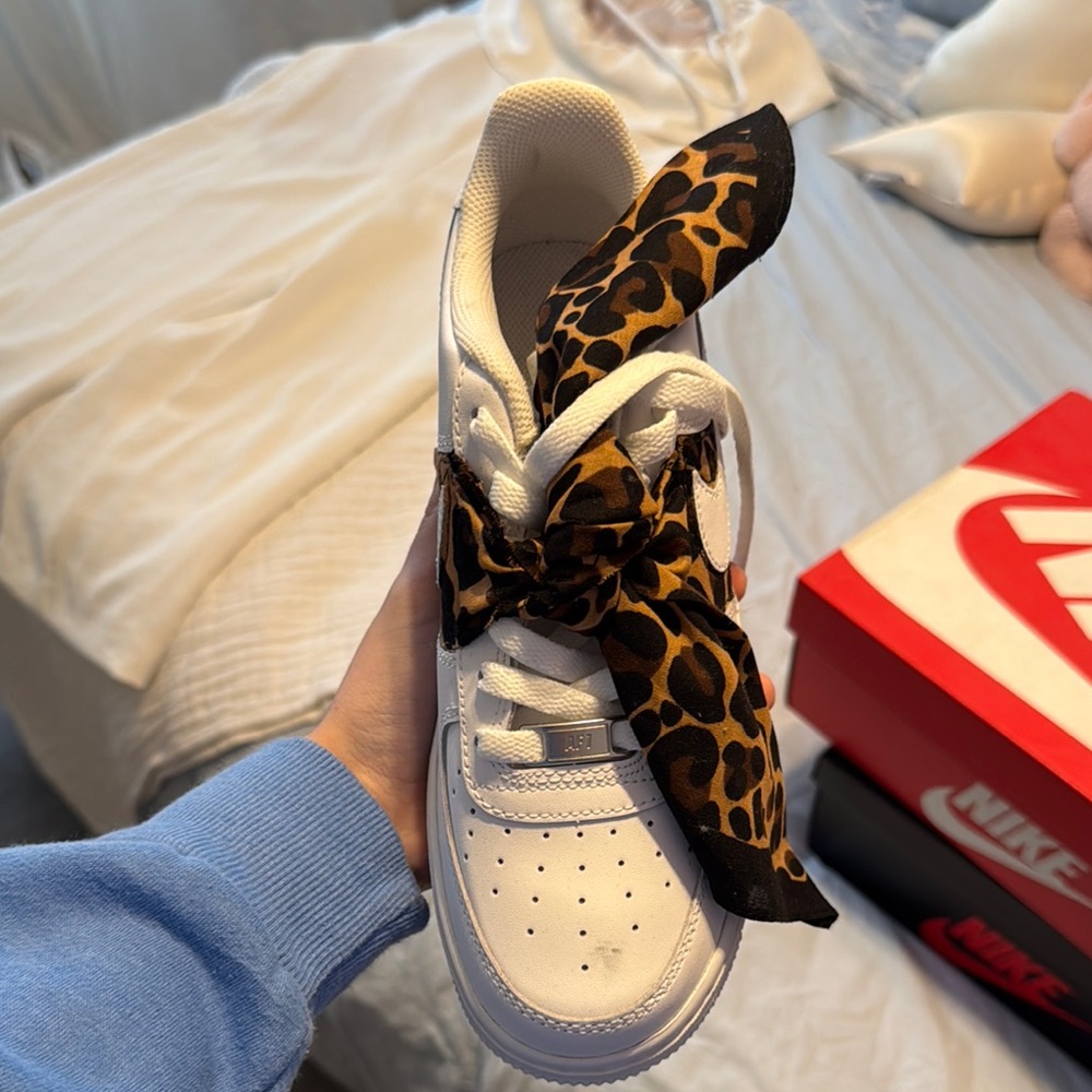 Nike Women's White Sneakers with Leopard Print Accent